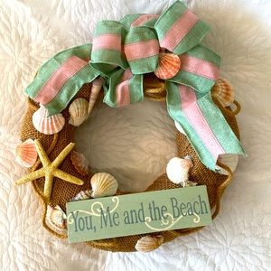 Wreath for walls or doors. About 13” wide. Made with real beach shells.